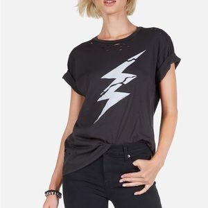 Vintage tee with rips and lightening bolt on front in white